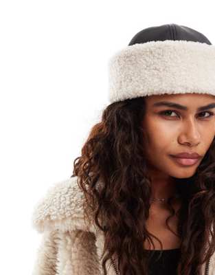 Weekday Weekday faux leather hat with borg trim in black