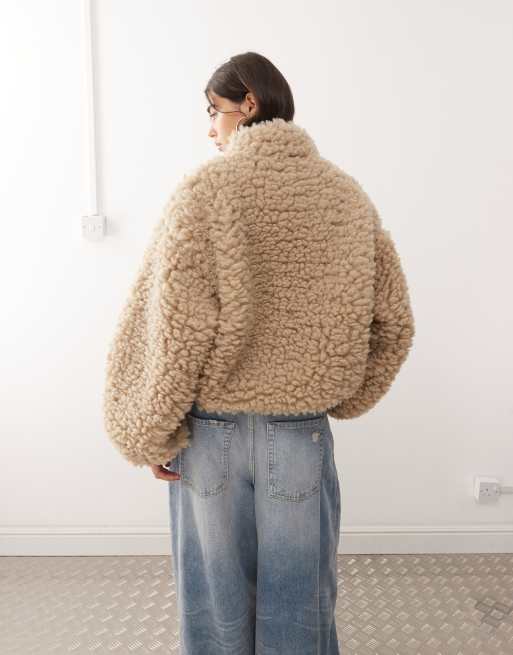 Weekday fluffy pile fleece in beige | ASOS