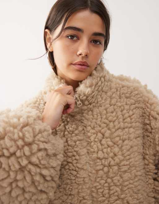 Weekday fluffy pile fleece in beige | ASOS