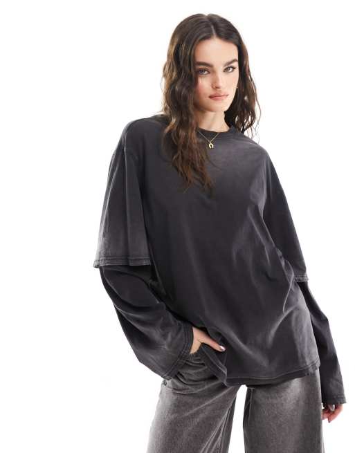 Weekday - Forvasket, sort og oversized top med dobbelte lange ærmer