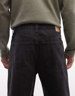 Weekday Galaxy loose fit straight leg jeans in tuned black | ASOS