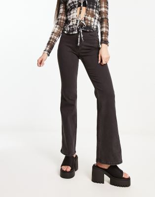 Weekday Glow high waist flared stretch jeans in black lux