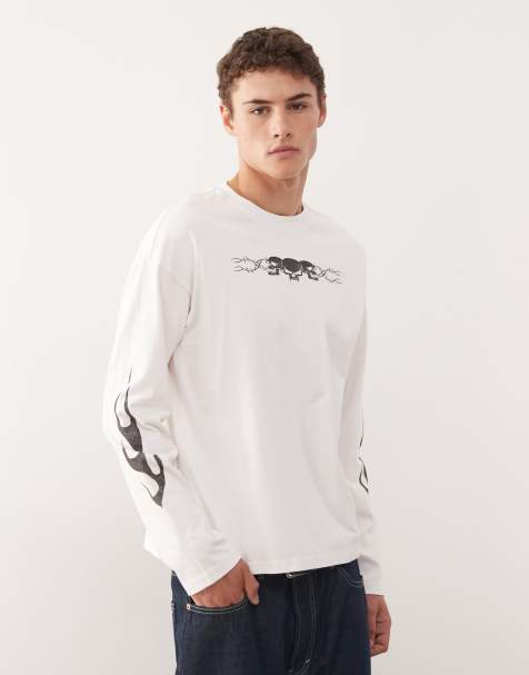 Weekday – Great – T-shirt o pudełkowym kroju z długimi rękawami i nadrukami z czaszką w kolorze złamanej bieli - view 1
