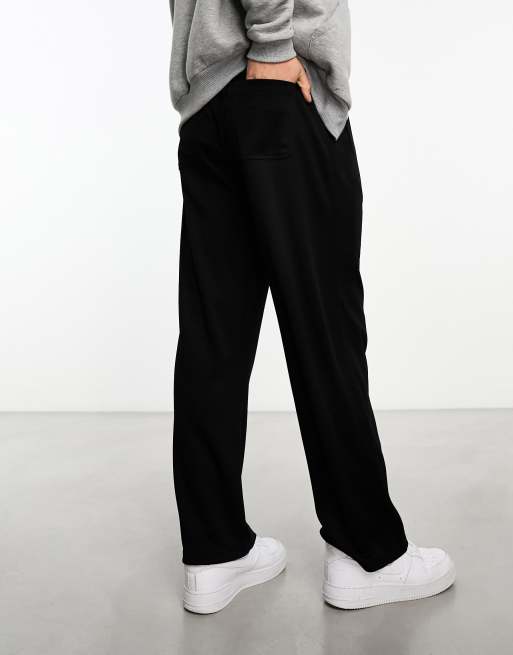 Weekday Hank tracksuit pants in black