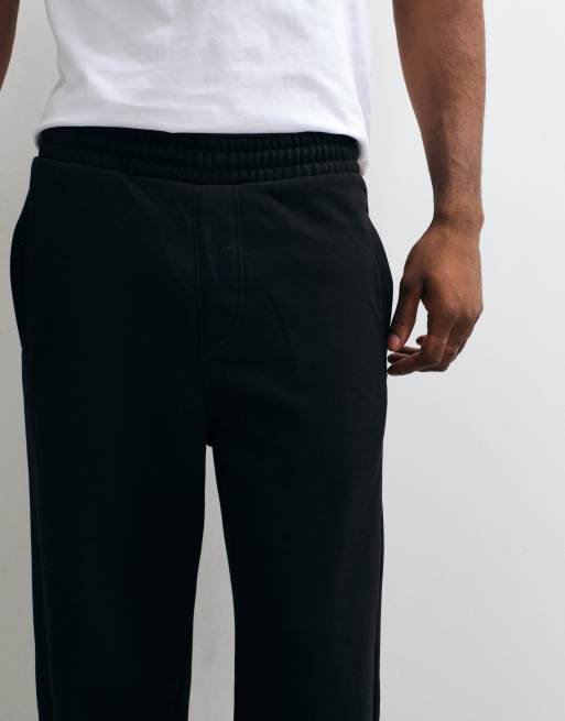 Weekday heavyweight jersey oversized wide leg trackies in black, 2 of 5