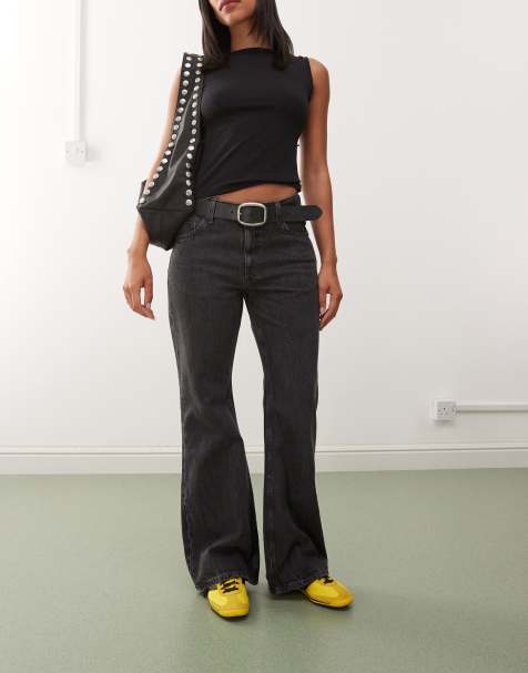 Weekday Helix low waist wide flare jeans in worn black wash