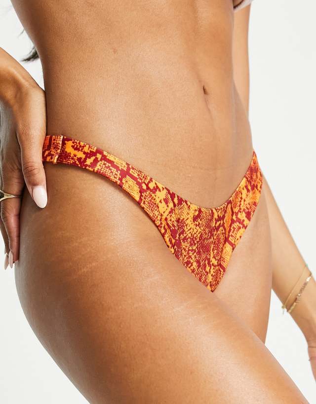 Weekday - high leg snake print bikini bottom in orange - orange