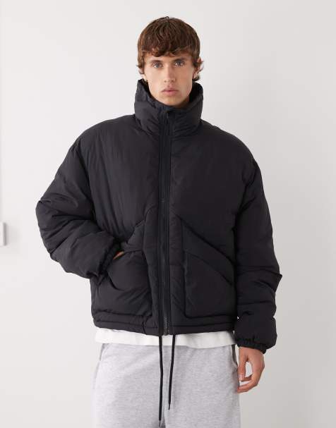Weekday high neck puffer jacket in black - view 1