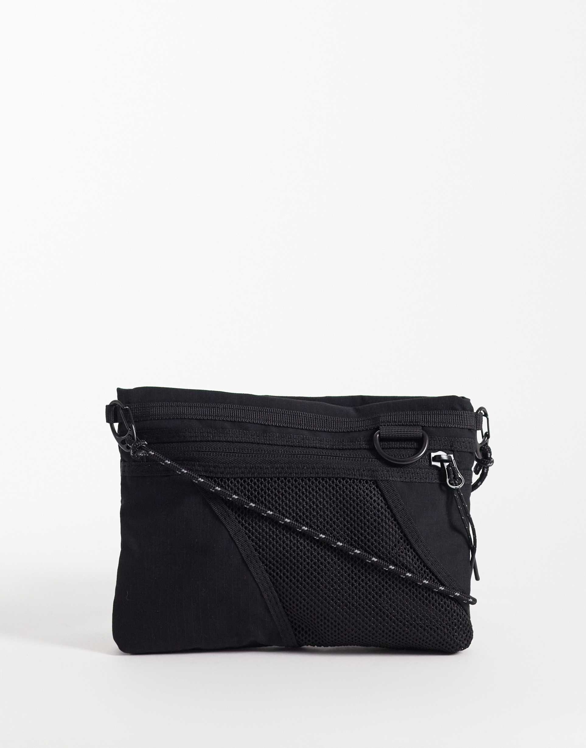 weekday hiker mini cross body bag with mesh detailing in black
