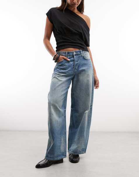 Weekday jeans met lage taille, baggy, wijde pijpen en distressed details in vervaagde blauwe wassing - view 1