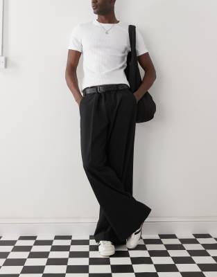 Weekday Weekday Jimi low waist baggy fit tailored trousers in black