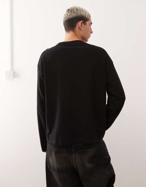 Weekday – Kastiges, langärmliges Oversize-T-Shirt in Schwarz mit Panther-Grafik am Ärmel, 3 von 5