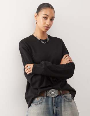 Weekday - Kastiges, langärmliges Oversize-T-Shirt in Schwarz