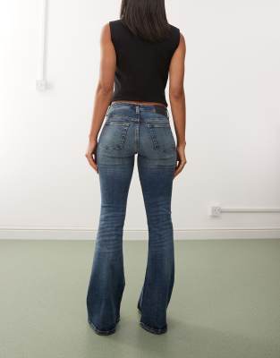 Weekday Katsumi Low Waist Flared Jeans In Black