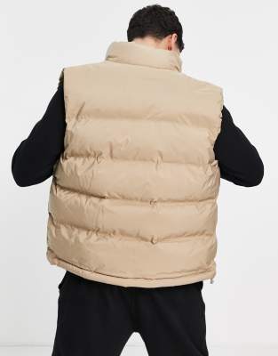 beige puffy vest