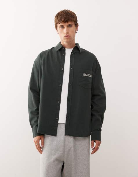 Weekday – Langärmliges Oversized-Fit-Hemd in Dunkelgrün mit Textstickerei - view 1