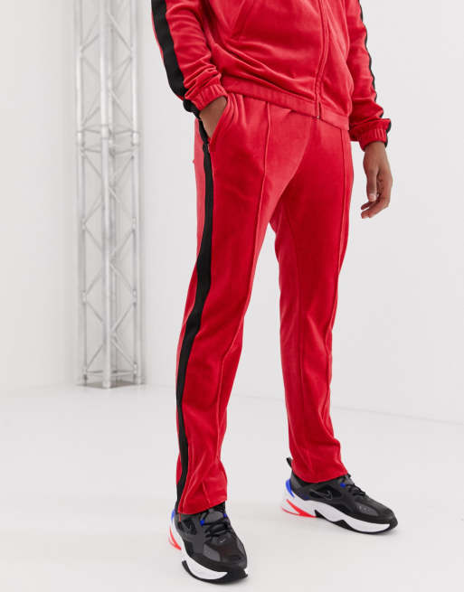 Weekday Local velour joggers in red ASOS