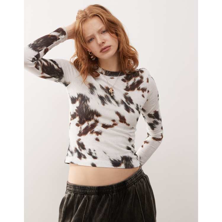 Weekday long sleeve top in cow print exclusive to ASOS | ASOS