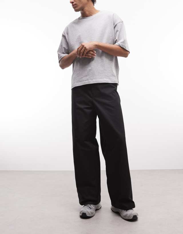 Weekday loose fit chino pants in black | ASOS