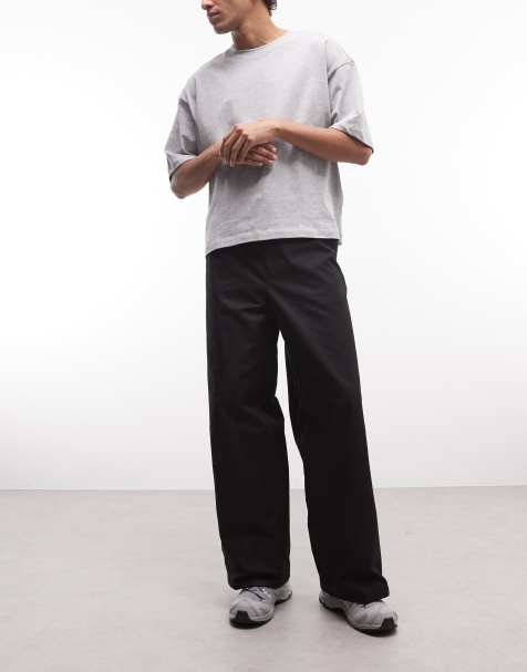 Weekday loose fit chino trousers in black - view 1