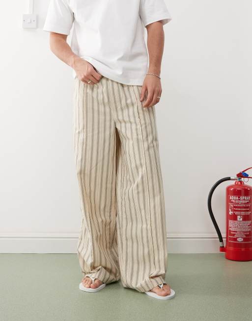 Weekday loose fit trousers in beige and black stripe