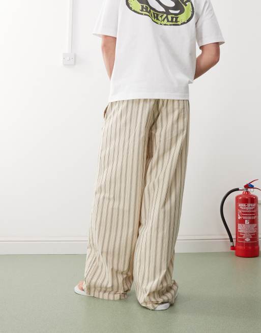 Weekday loose fit trousers in beige and black stripe