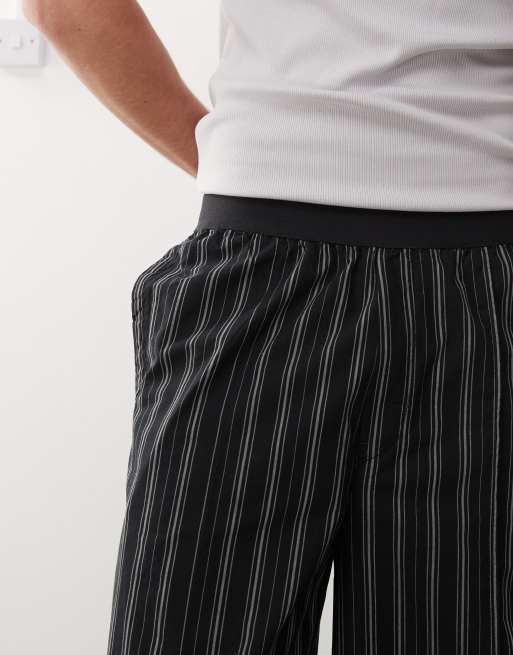 Weekday loose fit pants in black and beige stripe