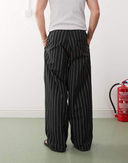 Weekday loose fit pants in black and beige stripe