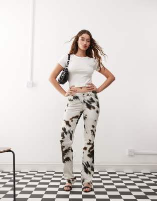 low rise straight leg pants in cow print-White