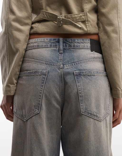 Weekday low waist baggy wide leg jeans with distressed details in blue with pink tint, 4 of 5
