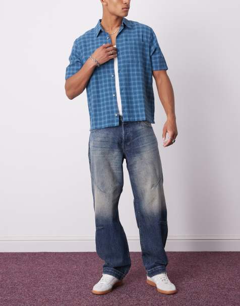 Weekday low waist loose fit barrel leg jeans with dart shaping in washed blue - view 1
