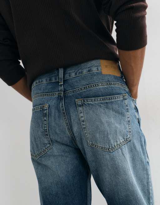 Weekday low waist straight leg jeans in faded blue wash, 4 of 5