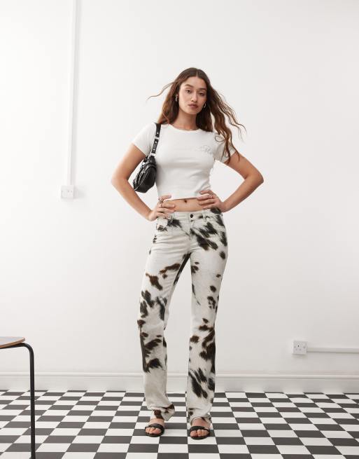 Weekday low waist straight leg trousers in cow print | ASOS