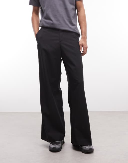 Weekday low waisted baggy suiting pants in black, 2 of 5