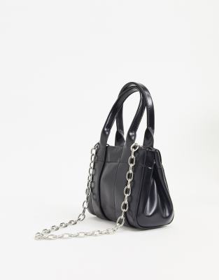 silver chain black bag