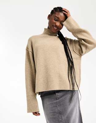 Weekday Maggie wool turtle neck jumper with exposed seam detail and wider sleeves in beige melange-Neutral