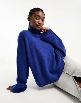 Weekday Maggie wool turtle neck jumper with exposed seam detail and wider sleeves in blue melange - ASOS Price Checker