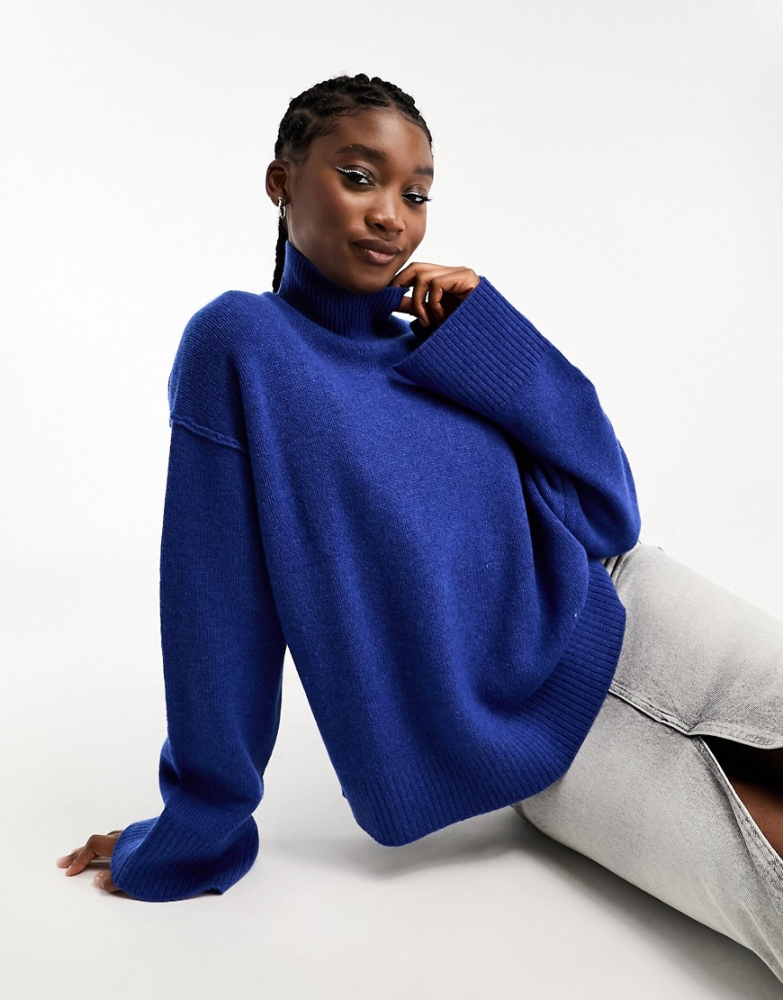 Weekday Maggie Wool Turtle Neck Sweater With Exposed Seam Detail And Wider Sleeves In Blue Melange