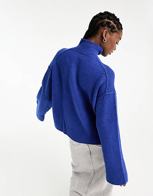 Weekday Maggie wool turtle neck sweater with exposed seam detail and wider  sleeves in blue melange | ASOS