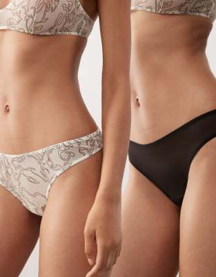 Weekday mesh lace thong 2-pack in off-white & black - view 1