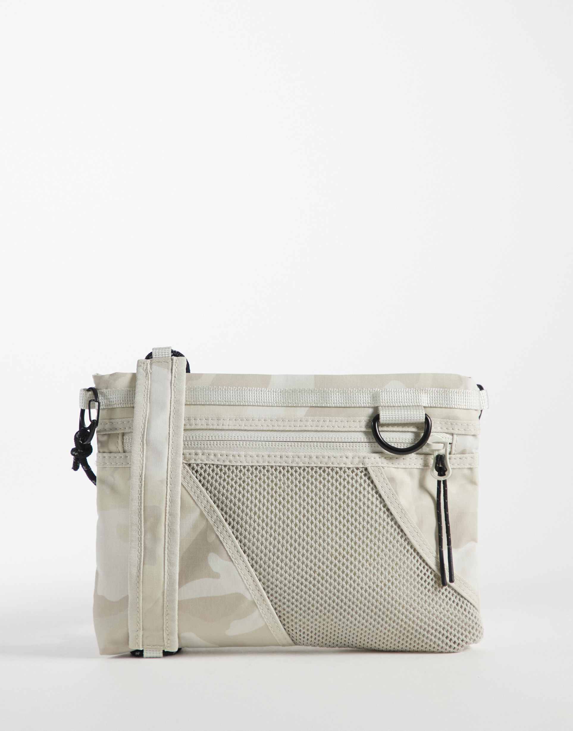 weekday mini cross body hiking bag with mesh detailing in camo print