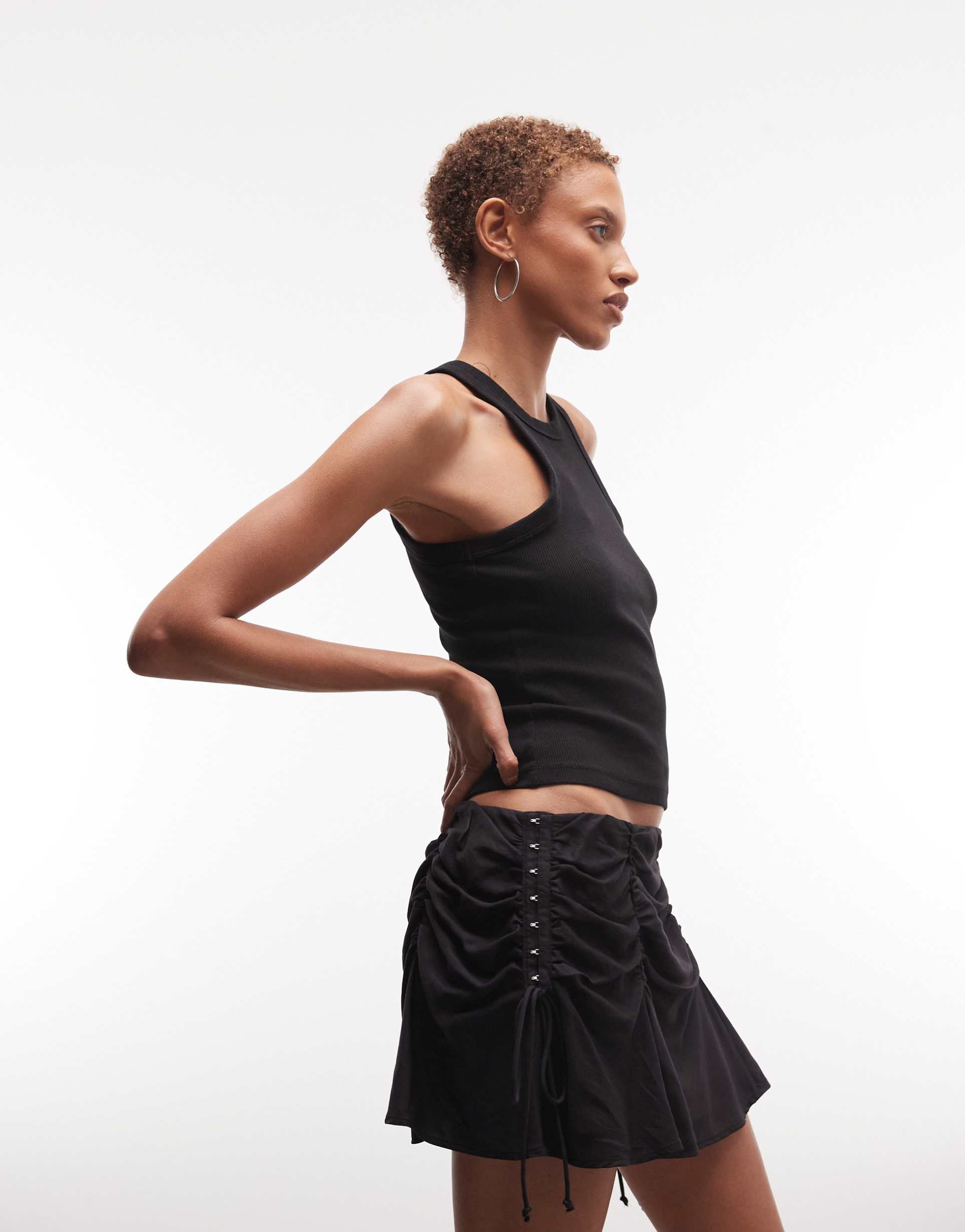 weekday mini skirt with gathered hook and eye detail in black