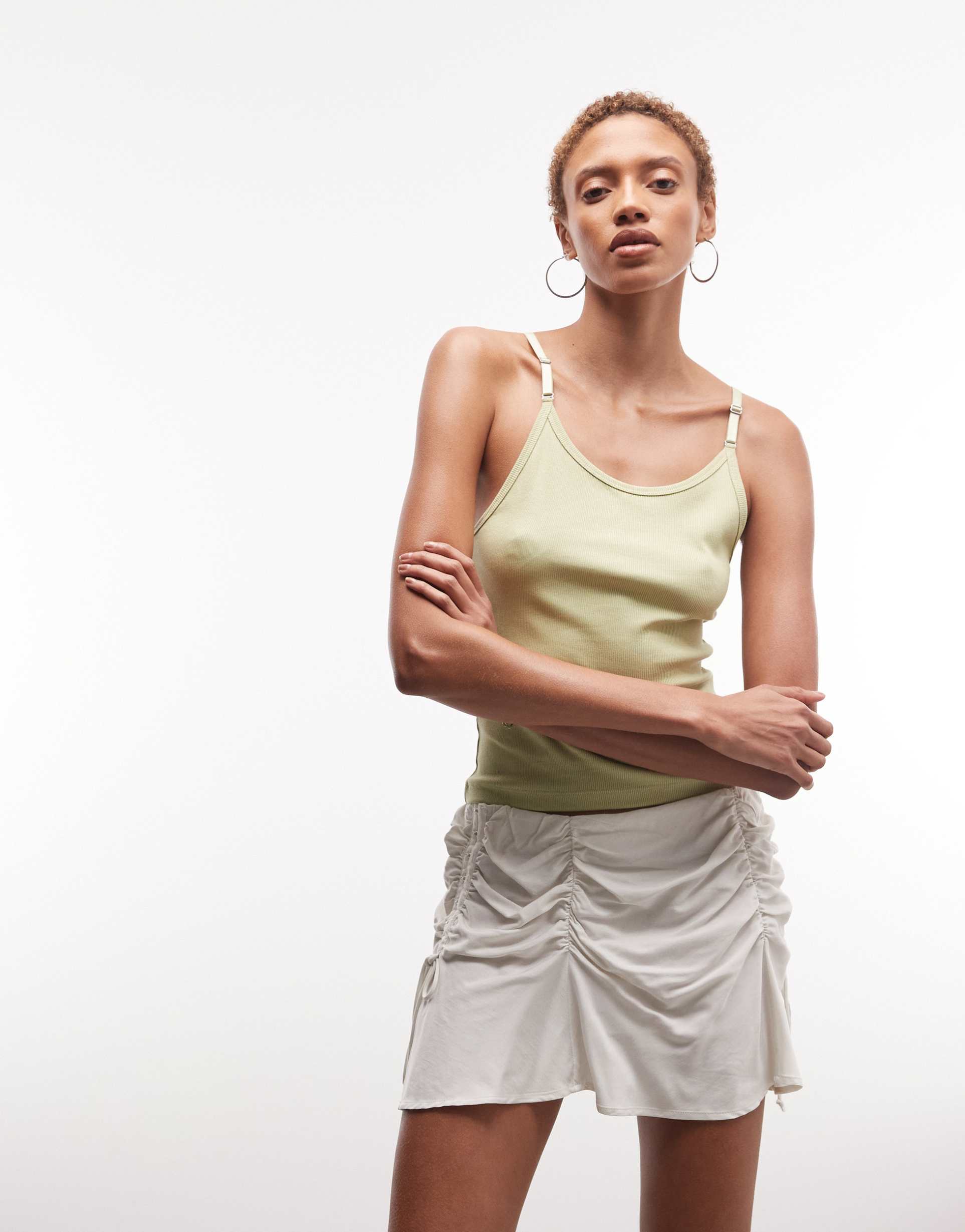 weekday mini skirt with gathered hook and eye detailing in off white