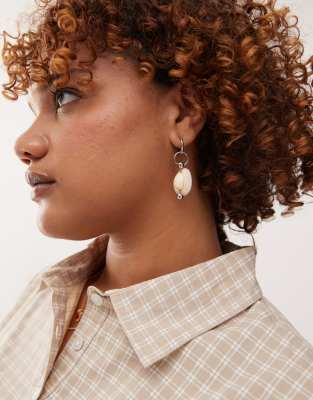 mismatched shell earrings in silver tone