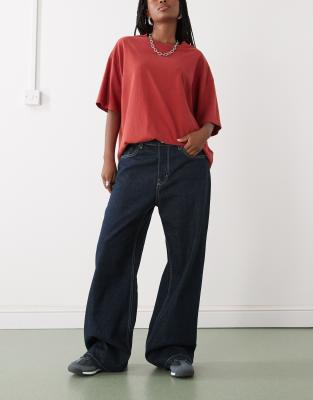 Weekday - Missy - Baggy Fit Jeans in Dunkelblau mit niedrigem Bund