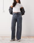 [Weekday] Weekday Missy low waist loose fit jeans in streaky blue wash W24 L30 Pandora Blue