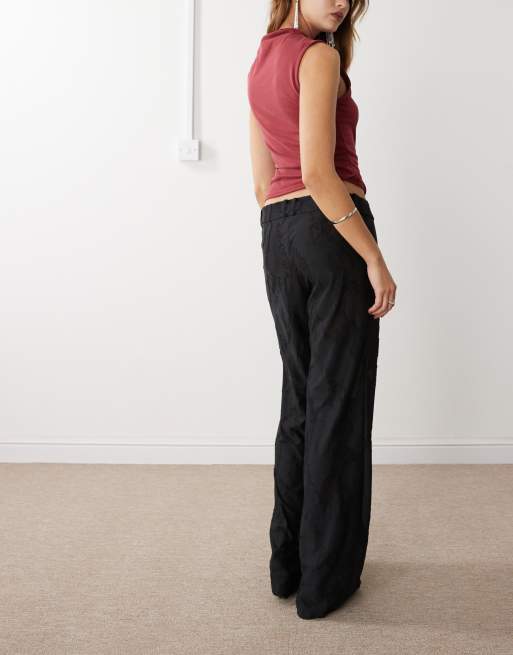 Weekday Naomi mix & match low waist burnout semi sheer trousers in black, 4 of 5