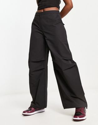 Weekday Nilo co-ord oversized tracksuit trouser in black - ASOS Price Checker