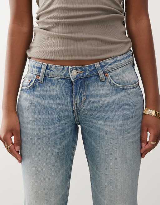 Weekday Nova low waist slim bootcut jeans in light blue wash 