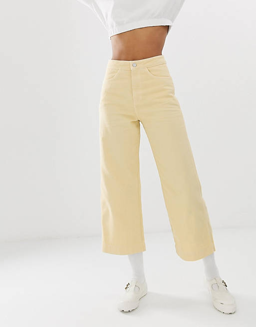 Weekday organic cotton wide leg cropped jeans in pastel yellow